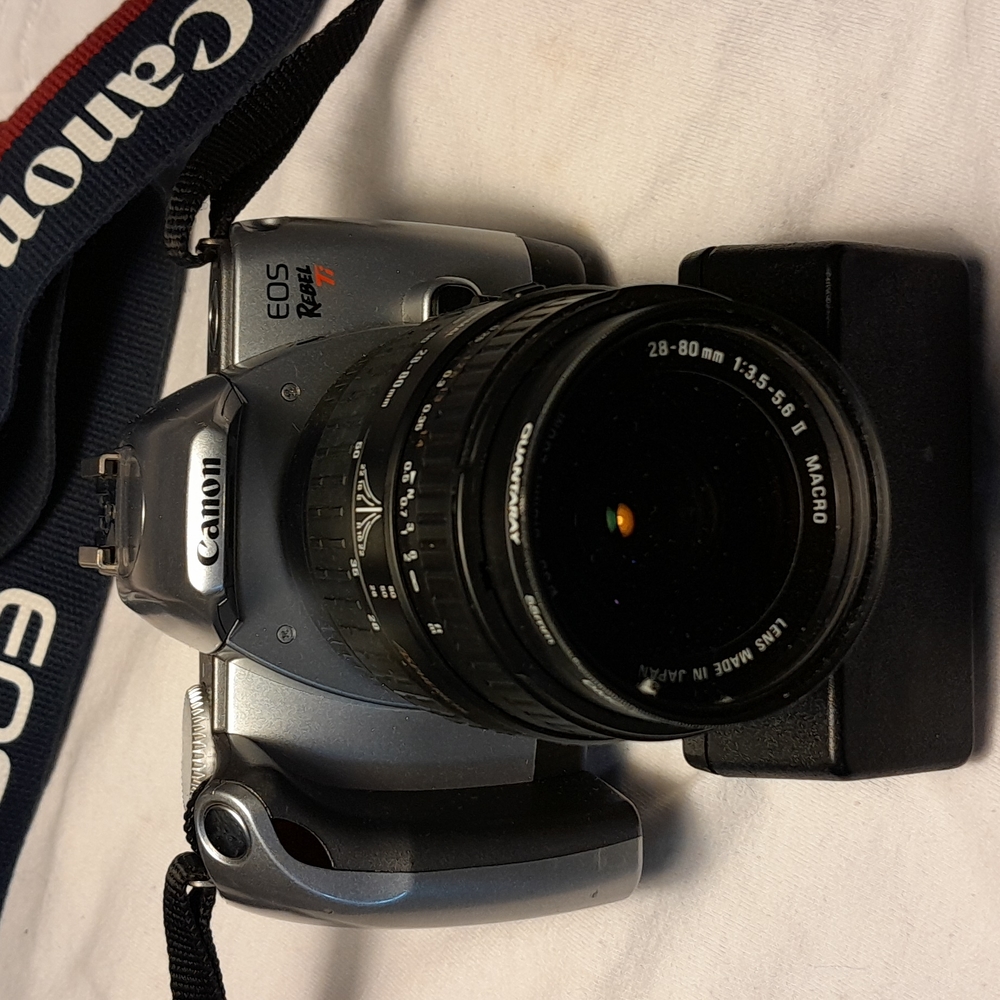 Canon EOS Rebel Ti / 300V film camera with carrying case.